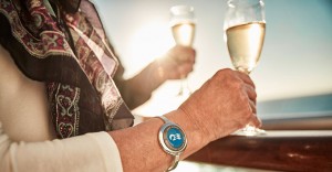 Woman wearing an Ocean Medallion wearable hospitality technology